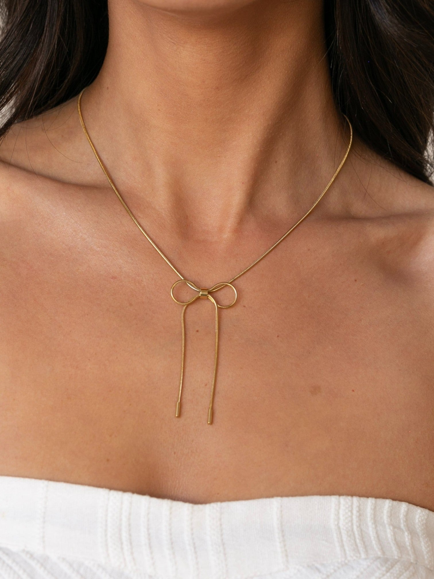 bow necklace gold